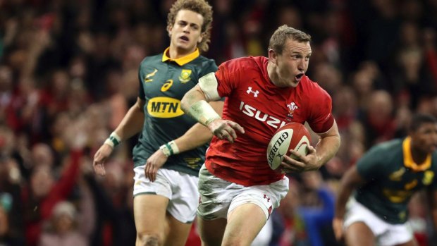 Day one: New Zealand-born Hadleigh Parkes scored two tries on debut, on the exact day he became eligible to represent Wales.