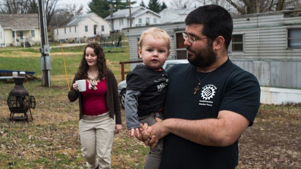 Matthew Heimbach, who runs the Traditionalist Worker Party, with his family at home in Paoli, Indiana. 