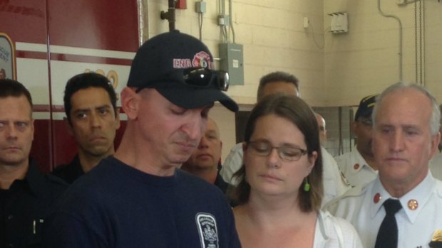 Steven Mittendorff, husband of missing paramedic-firefighter Nicole Mittendorff, reads a statement at a press conference before her body was found.