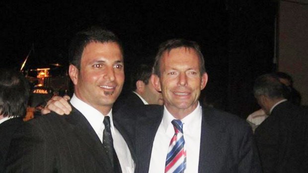 Councillor on Fairfield Council Paul Azzo poses for a photo with Tony Abbott.