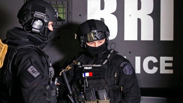 Members of the Research and Intervention Brigades, a unit of the French National Police.