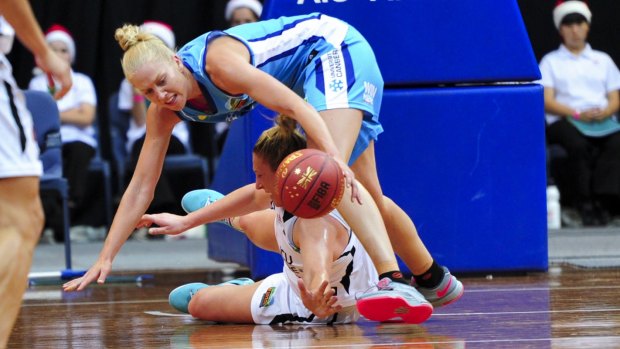 Abby Bishop tried hard but couldn't lift the Canberra Capitals to a win over Townsville Fire at the AIS Arena.