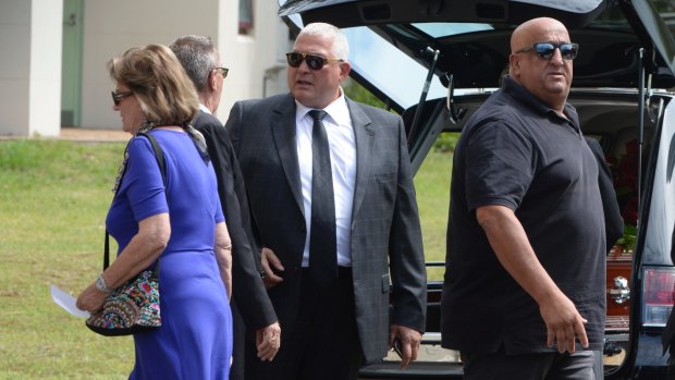 Mick Gatto (centre) and his bodyguard Ray Younan (right) at Tuesday's funeral.