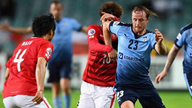 Rhyan Grant of Sydney FC takes on the Urawa Red Diamonds defence at their Asian Champions League clash last month.
