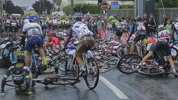 Riders crash during the fifth stage of the Tour de France cycling race, a  189.5-kilometre leg between Arras and Amiens, France.