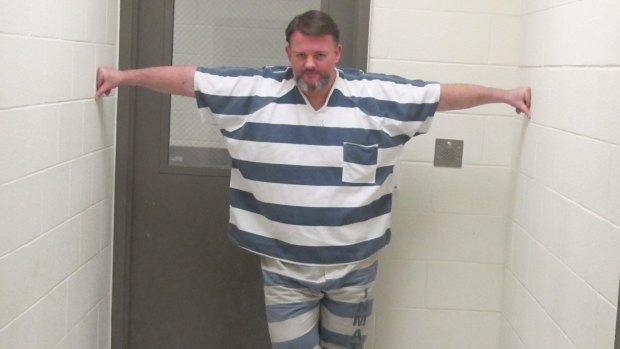 Australian Corey Donaldson, who robbed a US bank in 2012, and claimed he'd given all the loot to poor and needy, pictured at the Davis County Jail, north of Salt Lake City, Utah. 
GOOD WEEKEND Picture by PAUL McGEOUGH 
GW131221