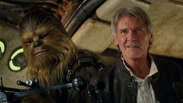 Chewbacca (Peter Mayhew) and Han Solo (Harrison Ford) in a scene from Star Wars: The Force Awakens.