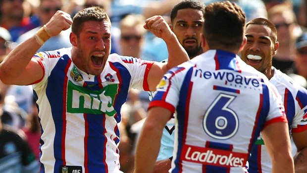 Joe Wardle of the Knights celebrates crossing for his first NRL try.