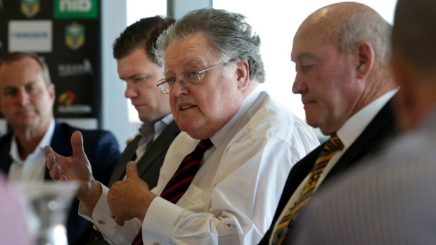 'Invidious position': Knights chairman Brian McGuigan, centre, hopes the club can act as a circuit-breaker in the current impasse. 