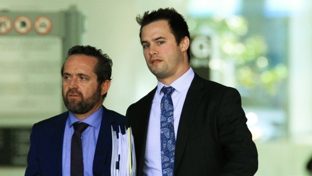Defence lawyer Dennis Kinsella (left) and his associate leave court.
