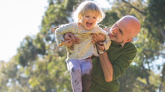 Jarek Luszpinski plays with his two year old daughter Pola.