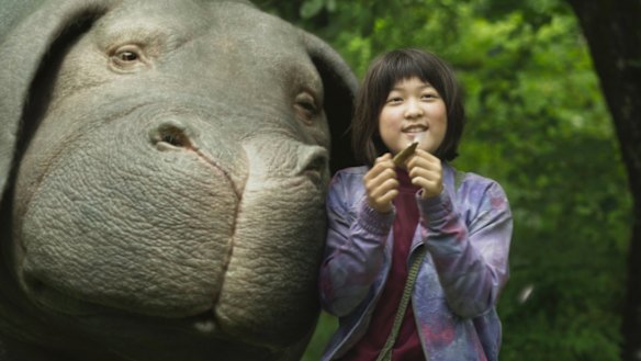Ahn Seo-Hyun Ahn as Mija with Okja. 