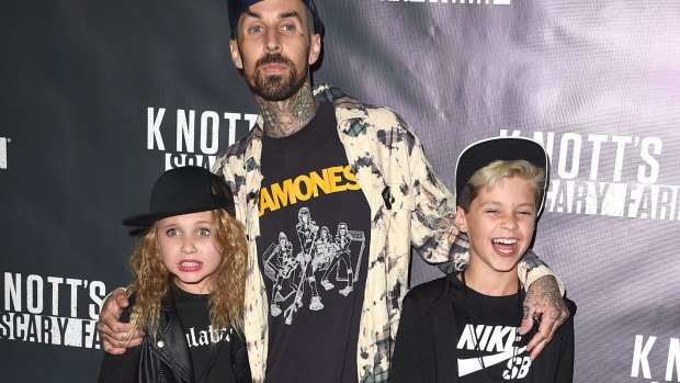 Travis Barker with his children in October.