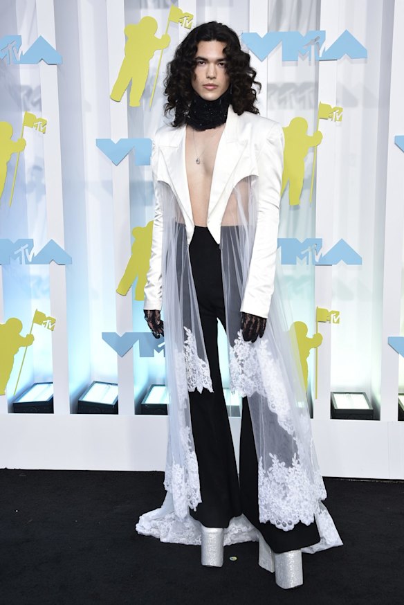 Conan Gray wears Harris Reed.