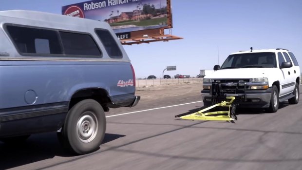 The grappler allows a pursuing car to stop a vehicle quickly.