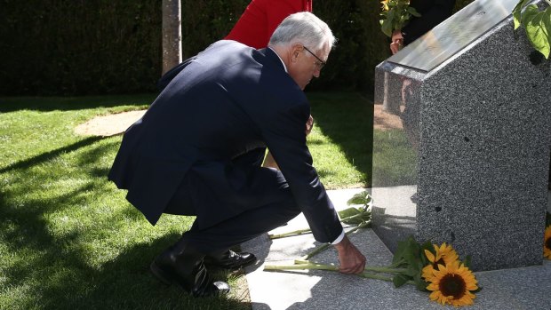 Prime Minister Malcolm Turnbull at an MH17 memorial in the gardens of Parliament House in Canberra. There will now also be a memorial in Amsterdam, where the ill-fated airliner took off.