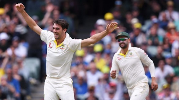 Lethal: Pat Cummins celebrates taking the wicket of Dawid Malan in Adelaide.