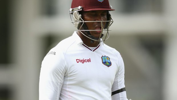 West Indies batsman Marlon Samuels departs Windsor Park after being caught at fine-leg.