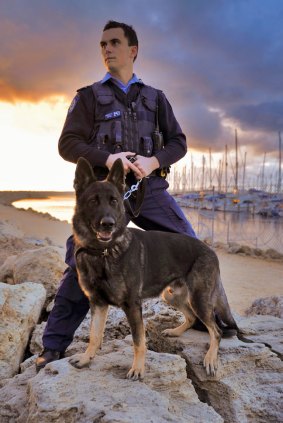 Police dog Rumble with Snr-Const Mathew Muletta.