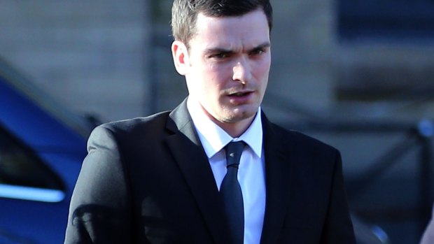 Adam Johnson arrives at the Crown Court in Bradford, England.