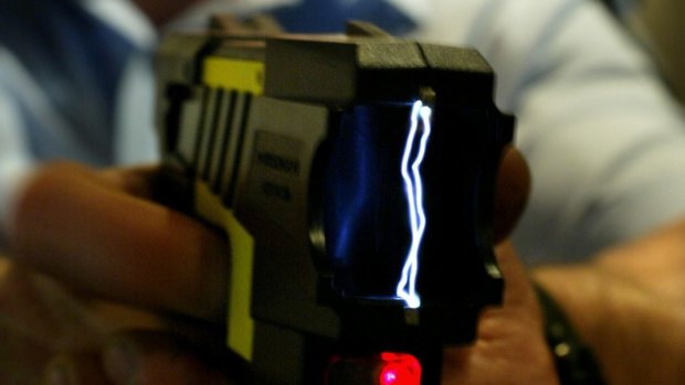 A Perth law school professor and his partner who were tasered by police won a damages claim.

