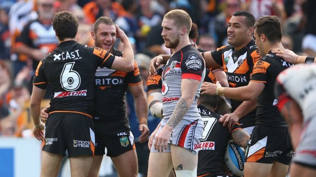 Try time: Mitchell Moses and Robbie Farah celebrate after Farah set up a try for Dene Halatau.