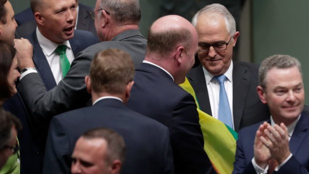 Trent Zimmerman and Prime Minister Malcolm Turnbull after the vote on the Marriage Amendment Bill at Parliament House.