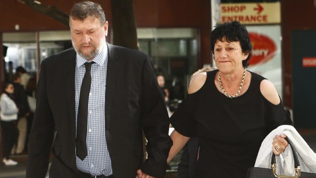 Late cricketer Phil Hughes' parents Greg and Virginia Hughes arrive at the inquest into his death on Friday.