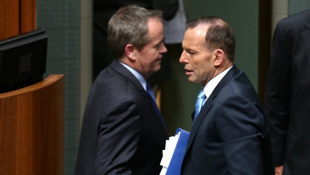 Opposition Leader Bill Shorten and Prime Minister Tony Abbott after a division in relation to the censure motion.