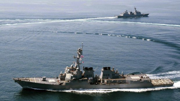 US Navy destroyer USS Lassen last year sails near Subi Reef, one of several artificial islands that China has built in the South China Sea. 