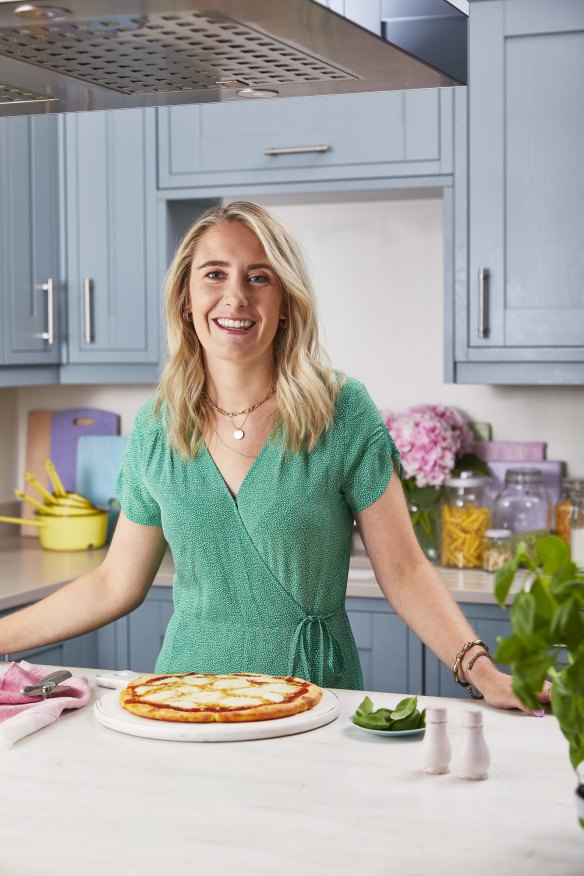 Becky Excell making a pizza.