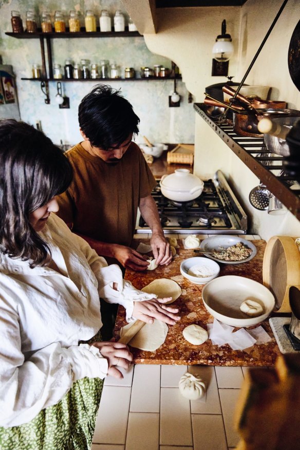 Julia Busuttil Nishimura cooking with her husband Nori Nishimura.