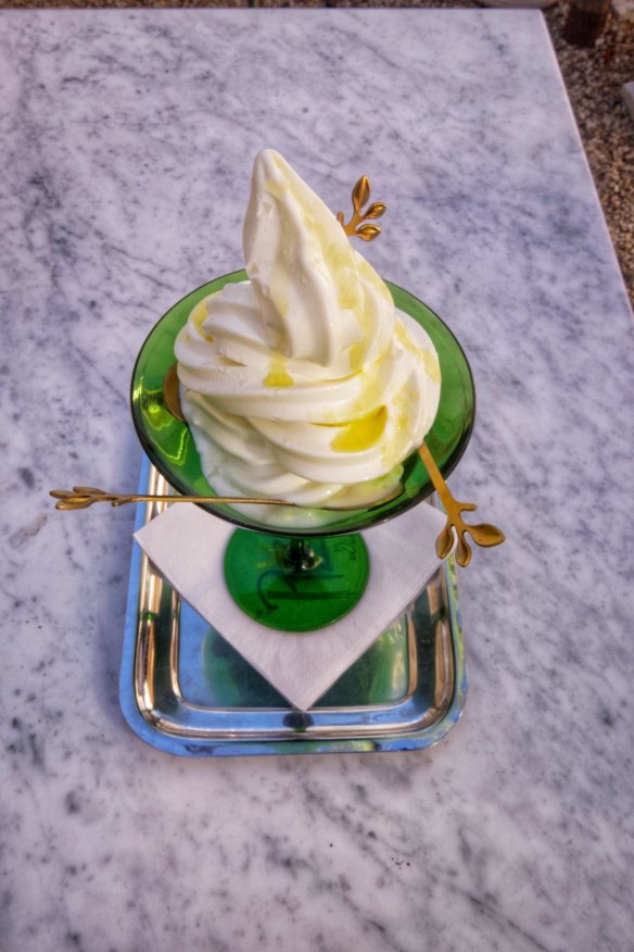 A tower of fior di latte soft serve, drizzled with good oil and tiny crystals of salt. 
