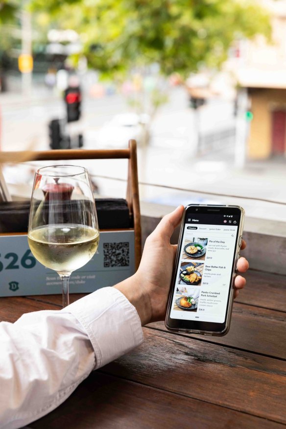 Phones at the table: The Mr Yum online ordering platform in action.