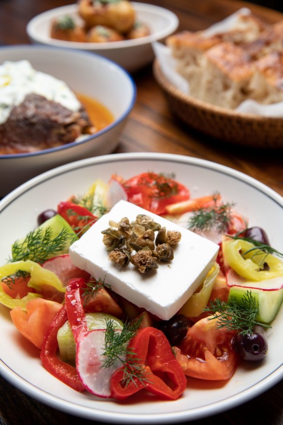 Village salad with tomato, cucumber, feta, olives and radish at Greca.