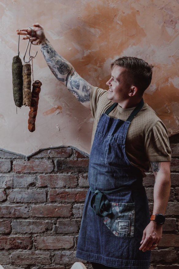 Elijah Holland with his house-made wild game charcuterie.