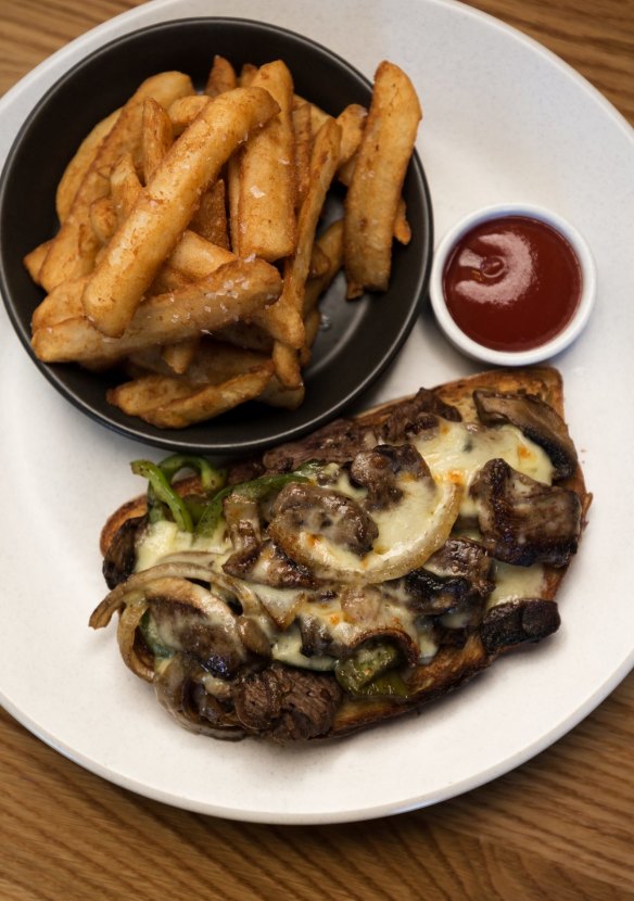 Philly cheesesteak open sandwich.