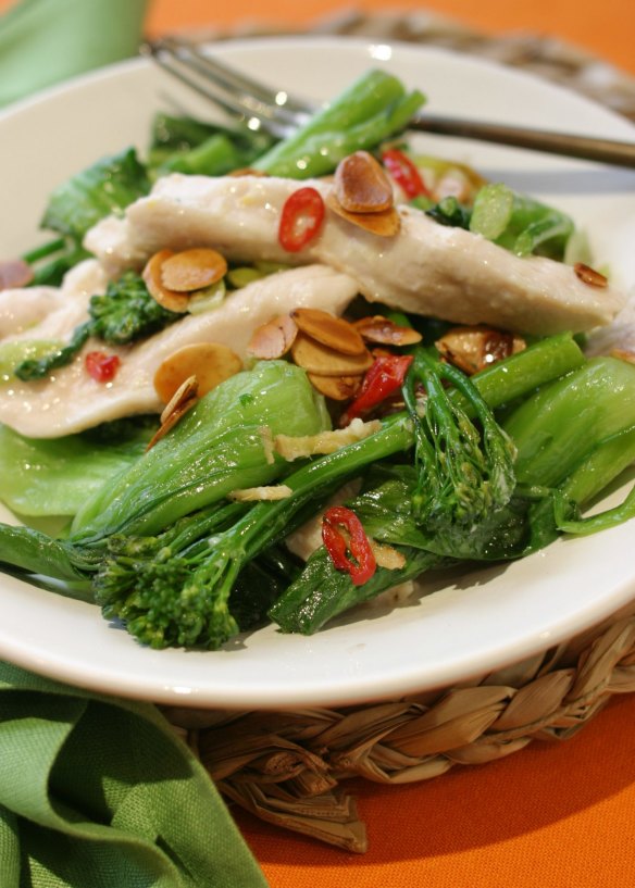 Velvet chicken with fried almonds and broccolini.