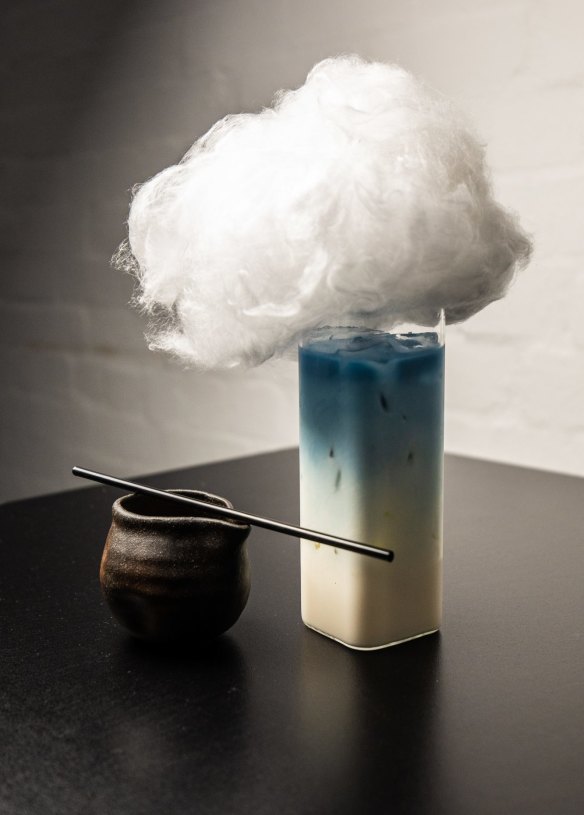 "Cloud coffee" (butterfly pea flower tea topped with fairy floss).