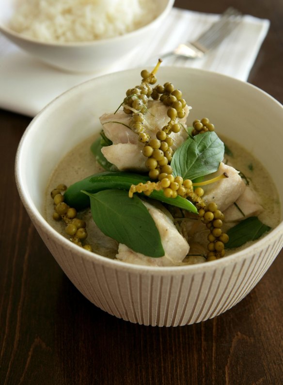 Thai green curry with green peppercorns and fish.