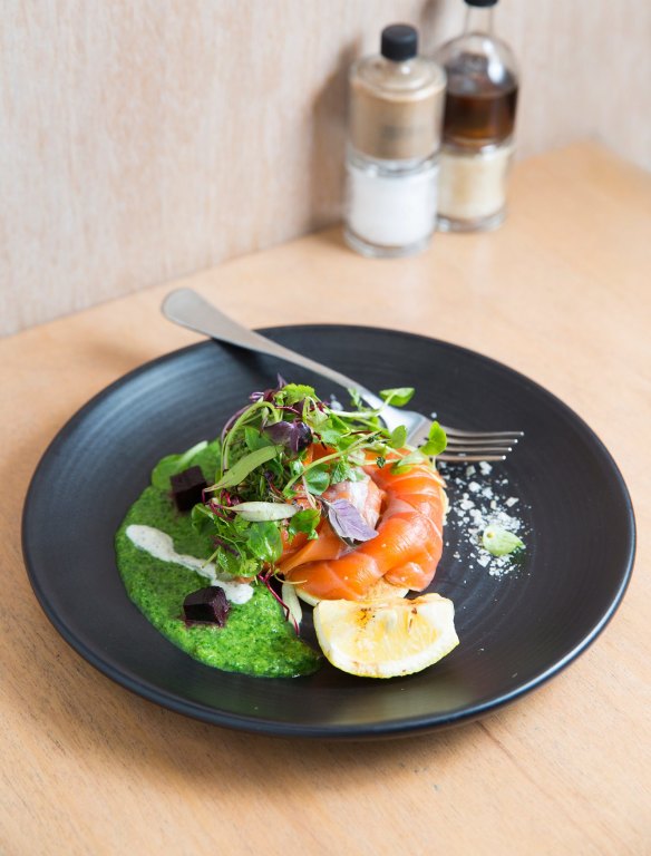 Citrus and herb cured salmon served with cucumber blinis, pea puree and beetroot jelly at Industry Beans in Fitzroy.