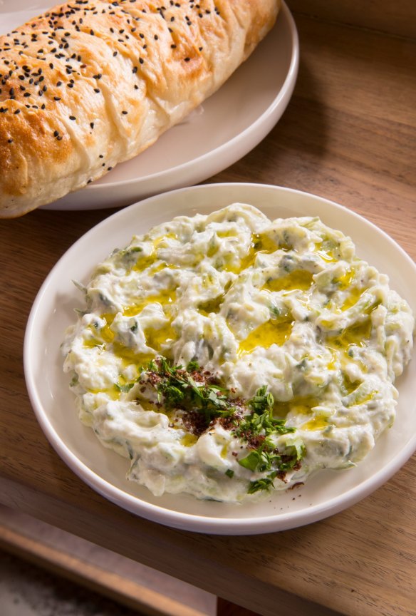 House-made Turkish bread  with yoghurt and cucumber cacik (dip).