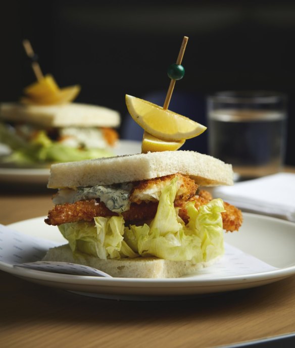 Crumbed fish sandwich with tartare and iceberg.