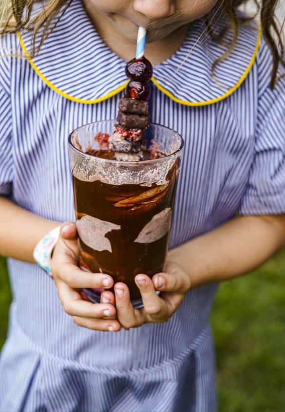 Choc-cherry milkshake with an optional swizzle stick.