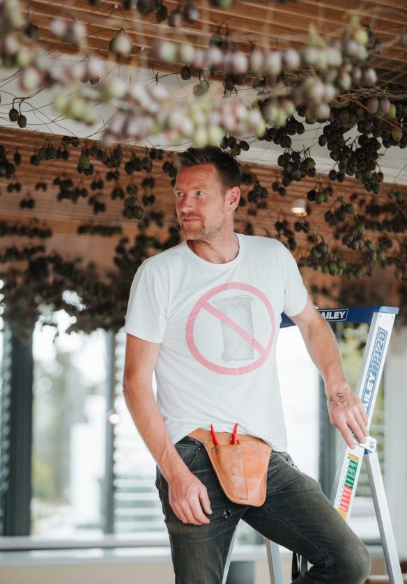 Joost Bakker installing his floral work in the Lexus marquee.
