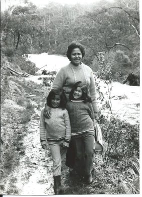 The sisters as children with mum Siniva.