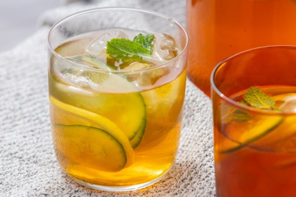 Iced tea with lemon, mint and cucumber.