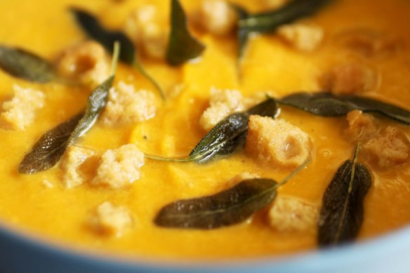 Pumpkin soup with amaretto biscuits.