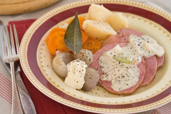 Corned beef with onion sauce and horseradish cream.