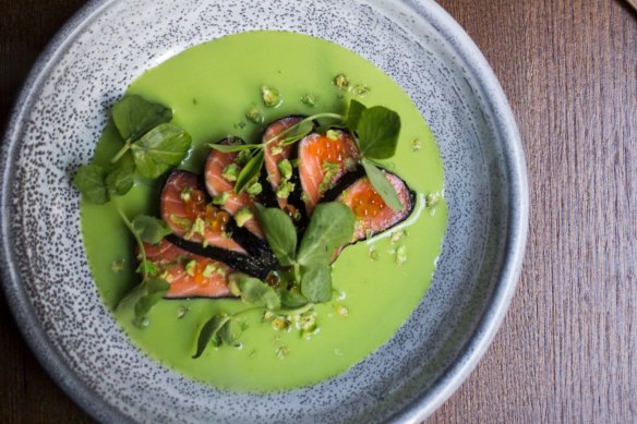 Quite the looker: Smoking salmon sashimi, wasabi pea and nori.